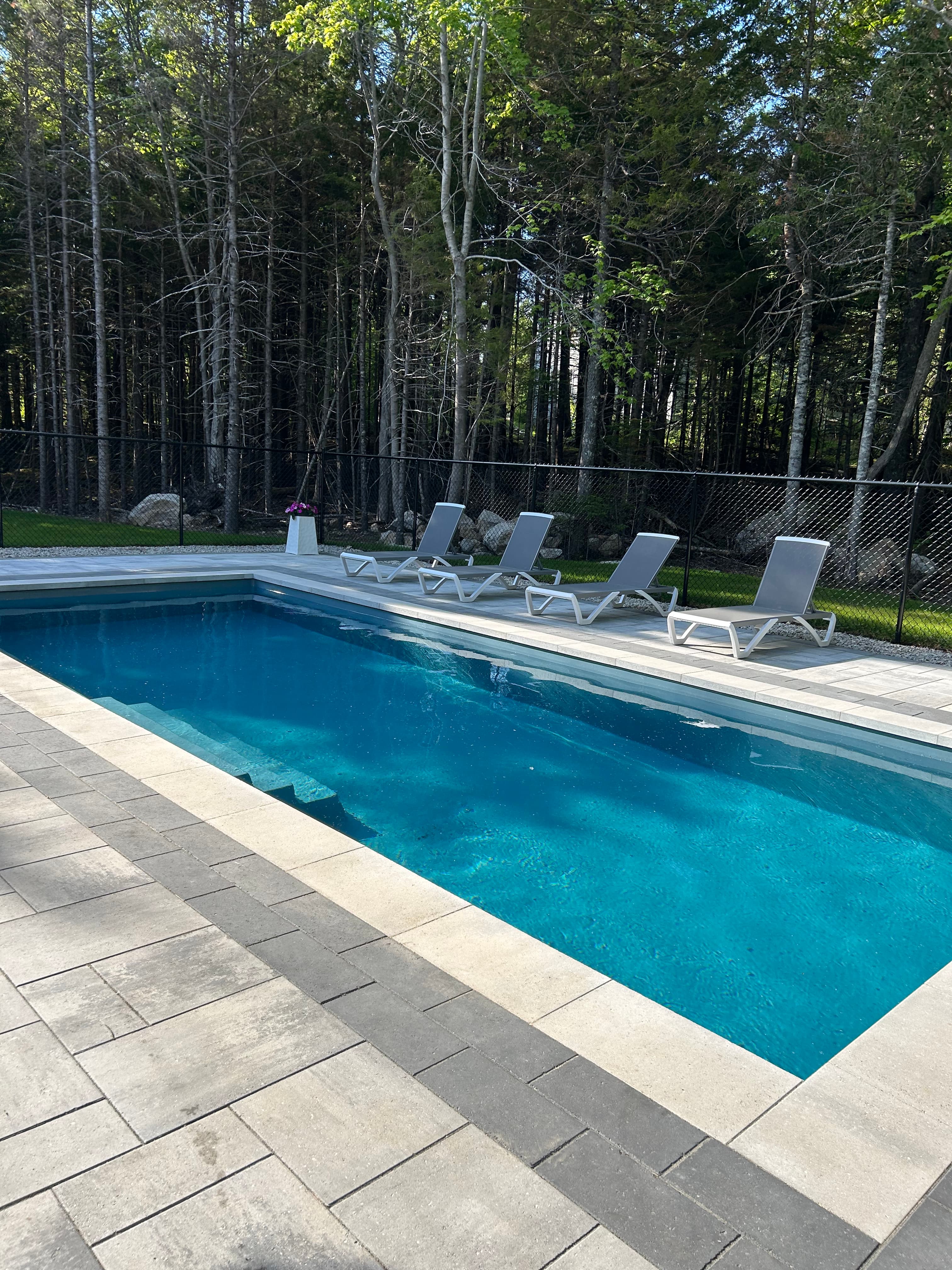 Aerial view of fiberglass plunge pool with paver surround