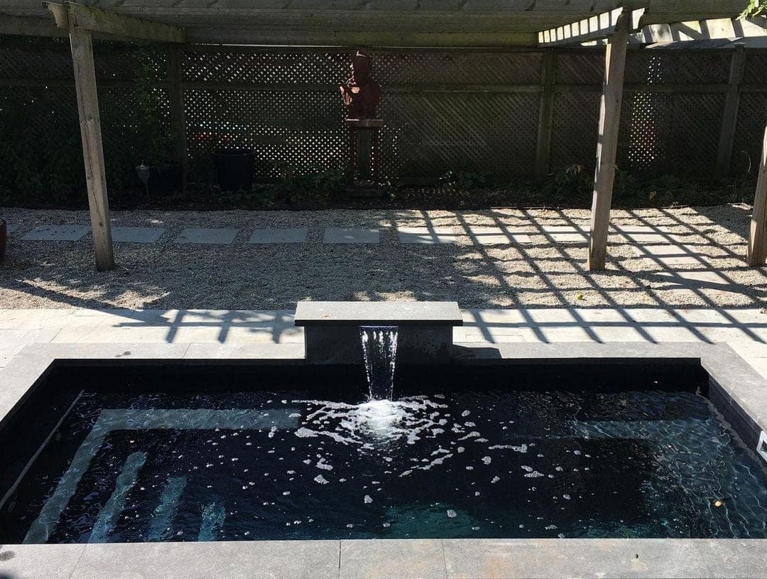 Dark grey plunge pool installation